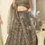 enticing Dark-grey thread embroidery net semi stitched lehenga