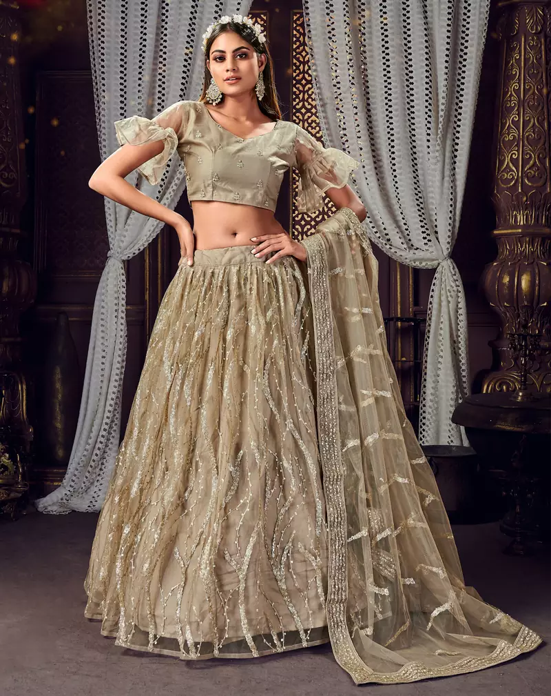 inviting Light-brown sequins, zari and thread embroidered net semi stitched lehenga