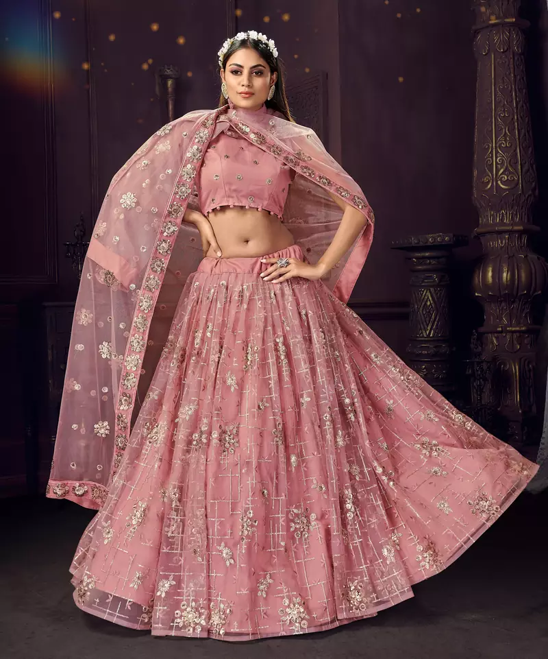 provocative Pink sequins, zari and thread embroidered net semi stitched lehenga