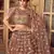 Irresistible Brown mirror net semi stitched lehenga