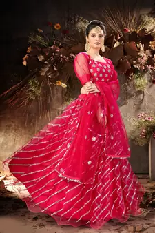 Enthralling Pink mirror net semi stitched lehenga