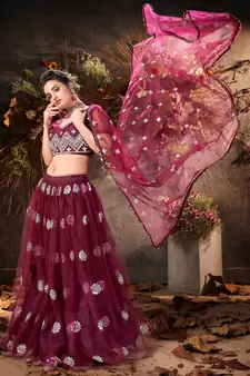 enticing Purple mirror net semi stitched lehenga