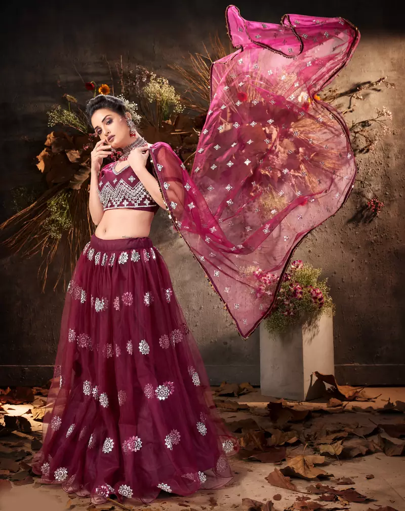 enticing Purple mirror net semi stitched lehenga