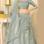appetizing Light-blue thread embroidery net semi stitched lehenga