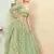 pleasant Light-green thread embroidery net semi stitched lehenga