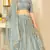 appetizing Light-blue thread embroidery net semi stitched lehenga