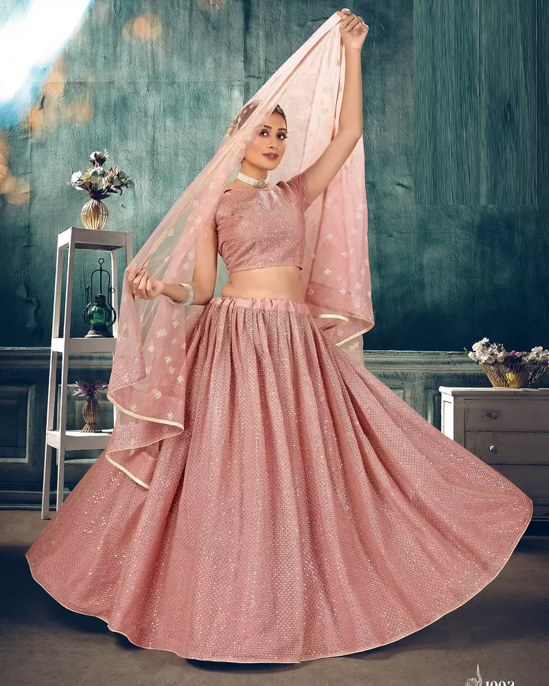endearing Peach thread embroidery net semi stitched lehenga