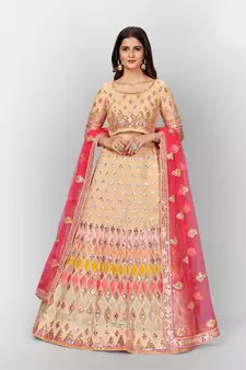 beguiling Beige thread embroidered with Foil Mirror and Cut Work Soft Tissue organza semi stitched lehenga