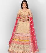 Beguiling Beige thread embroidered with Foil Mirror and Cut Work Organza Party wear Lehenga choli