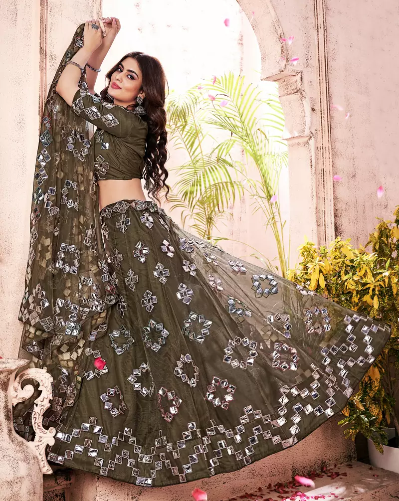 taking Dark-green thread embroidery net semi stitched lehenga