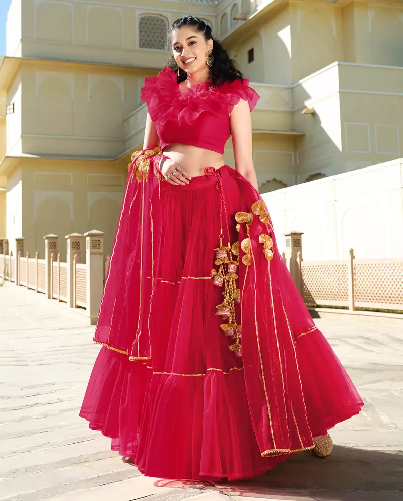 Mesmerizing Rani-pink gotta patti net semi stitched lehenga