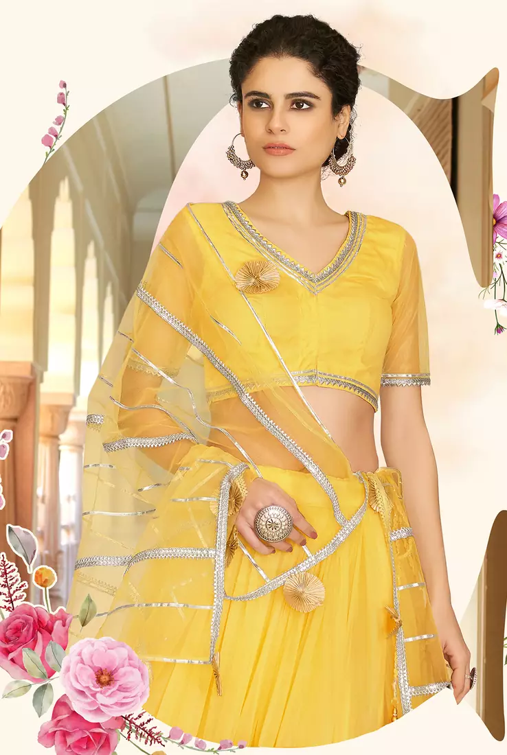Bewitching Yellow gotta patti net semi stitched lehenga