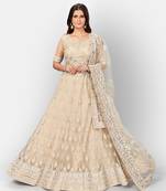 Fetching Beige thread and Zari Embroidered net Semi Stitched Lehenga