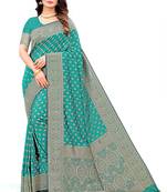 Dark green woven kanchipuram silk blend saree with blouse