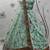Pista Green thread with sequins embroidered silk semi stitched wedding lehenga