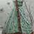 Pista Green thread with sequins embroidered silk semi stitched wedding lehenga