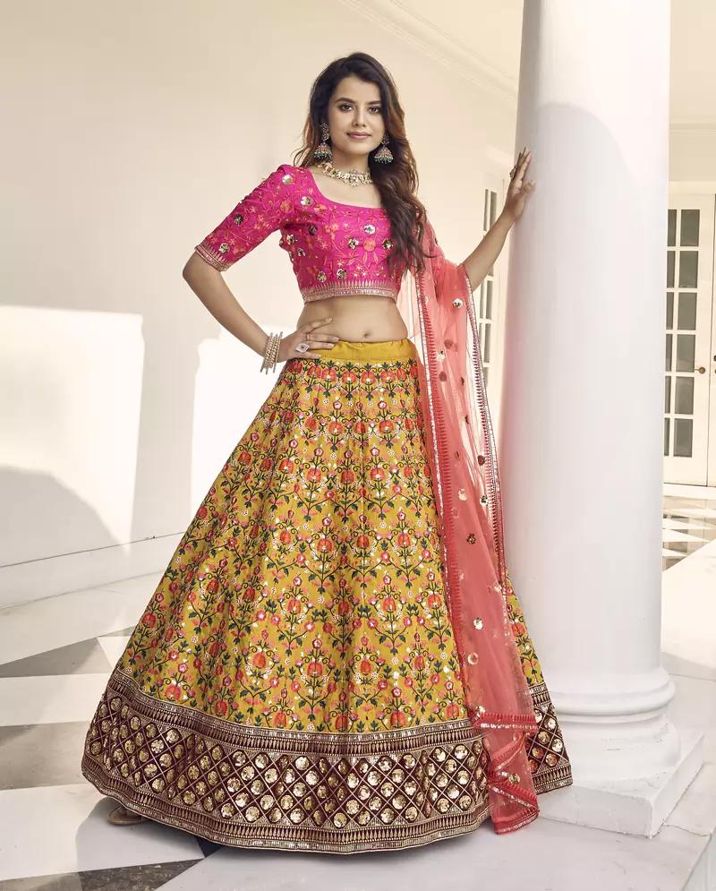Mustard-yellow & Pink thread with sequins embroidered art silk semi stitched party wear lehenga