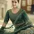 Graceful Green Mirror work with Dori Embroidered net Bridal Lehenga choli