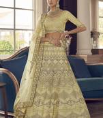 Yuma Lime Yellow zarkan, zari and thread embroidered crepe-Silk Semi Stitched Lehenga