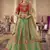 Green hand work, zari and thread embroidered jacquard lehenga