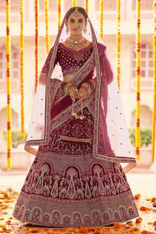 Maroon Zari, zarkan, zardosi and thread embroidered velvet semi stitched wedding lehenga