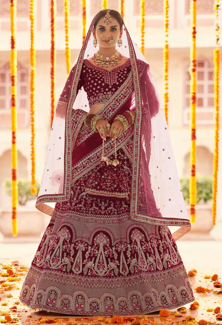 Maroon Zari, zarkan, zardosi and thread embroidered velvet semi stitched wedding lehenga