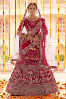 Red Zari, zarkan, zardosi and thread embroidered velvet semi stitched wedding lehenga
