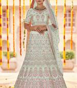 pistachios-green Sequins, zarkan and thread embroidered crepe Silk Semi Stitched wedding Lehenga