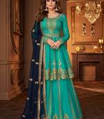 Turquoise embroidered georgette salwar