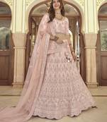 Watusi Pink Colored Dori Thread And Sequins Embroidered With Stone Work Crepe Lehenga Choli For Bride