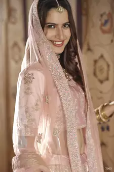 Watusi Pink Colored Dori Thread And Sequins Embroidered With Stone Work Crepe Lehenga Choli For Bride