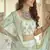 Frostee Green Dori, Thread and Sequins Embroidered with stone work crepe semi stitched lehenga
