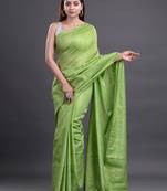 Green woven silk cotton saree with blouse