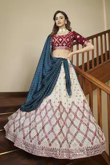 Beige & maroon Gota with thread and sequins embroidered georgette lehenga choli with gajji-silk teal blue dupatta