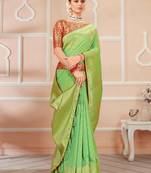 Parrot green woven banarasi silk saree with blouse