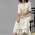 Indo Era Off White Solid Straight Kurta With Schiffli Trouser Set