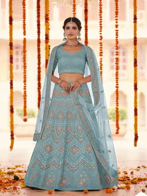 Turquoise embroidered organza semi stitched lehenga 1