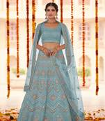 Turquoise embroidered organza semi stitched lehenga