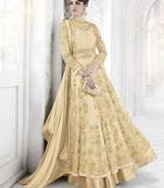 Beige embroidered net salwar