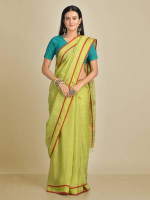 Green woven linen saree with blouse 1