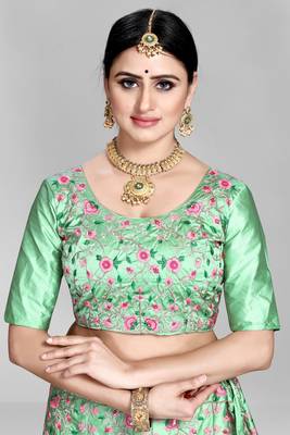 Green embroidered silk semi stitched lehenga 4