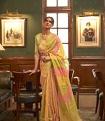 Yellow woven organza saree with blouse