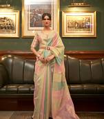 Peach woven organza saree with blouse