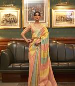 Pink woven organza saree with blouse
