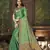 Green woven banarasi silk saree with blouse