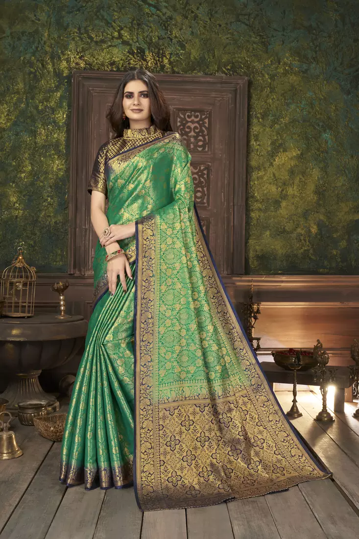 Green woven banarasi silk saree with blouse