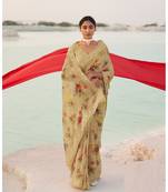 Beige printed georgette saree with blouse