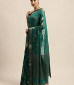 Green woven silk blend saree with blouse