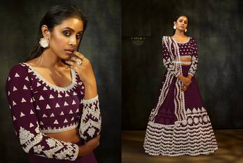 Wine embroidered net semi stitched lehenga 2