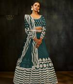 Dark-green embroidered net lehenga